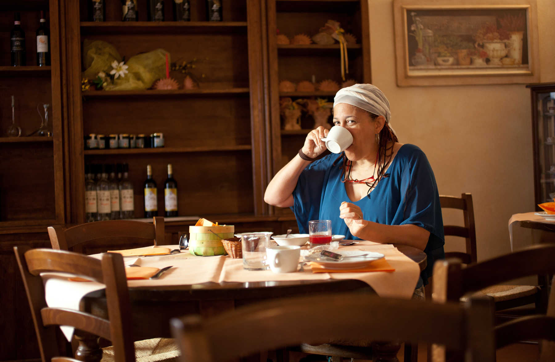 Woman Eating Italian Breakfast