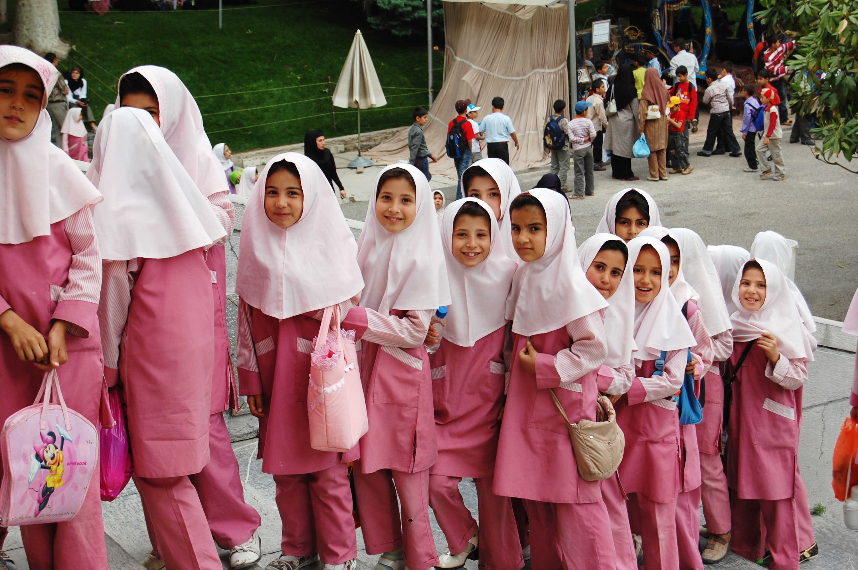 Iranian school girls in pink garments.
