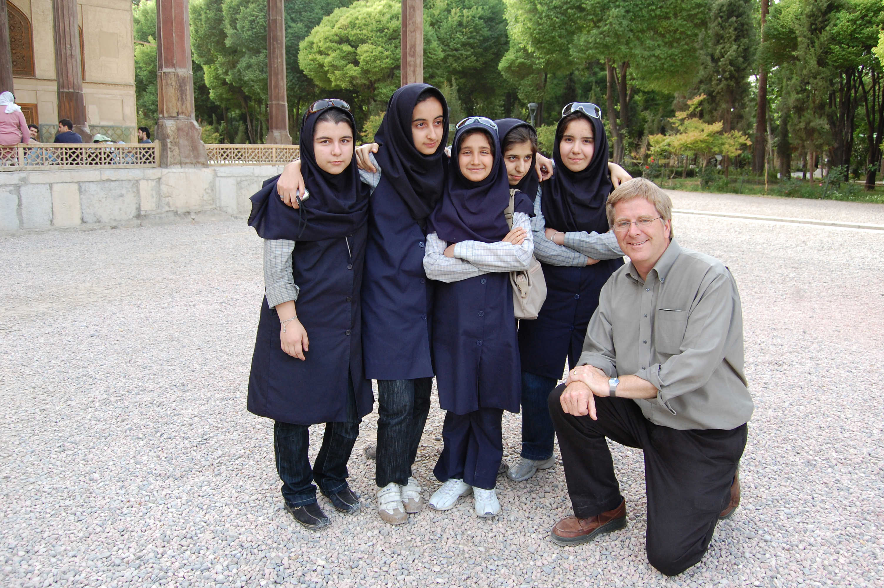 Rick Steves poses with Iranian teenagers.