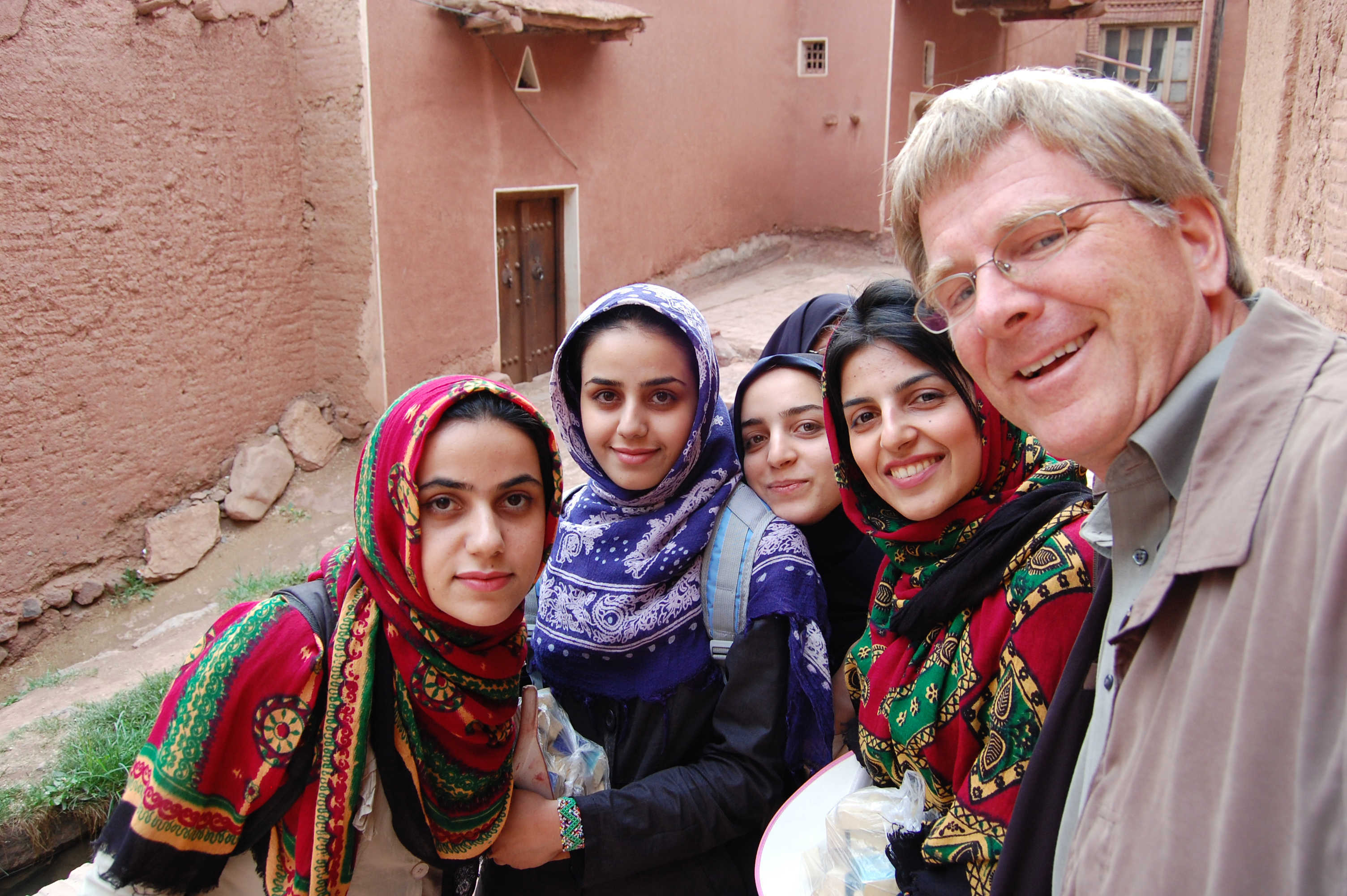 Village girls pose with Rick Steves in Iran
